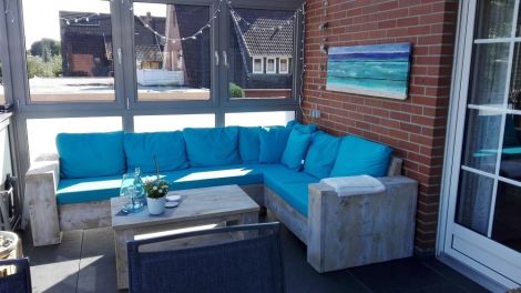 Bauholz Ecksofa Berlin mit transparentem Öl, Cartenza 220 Sea Green Kissen